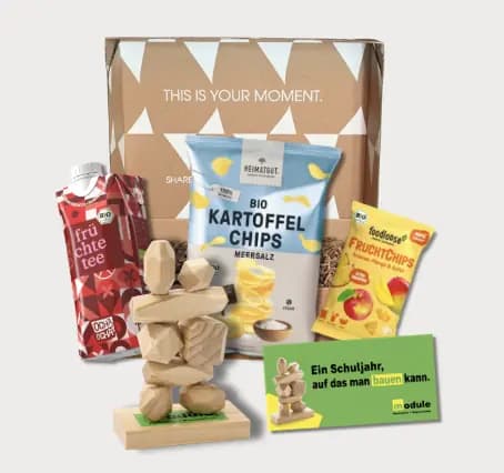 Box von module Gerüstbau mit Holzbausteinen und Snacks zum Schulstart